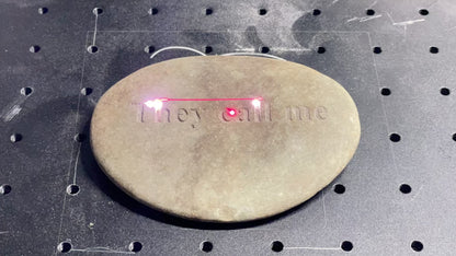 tans tone being engraved with "they call me" by laser engraver, video