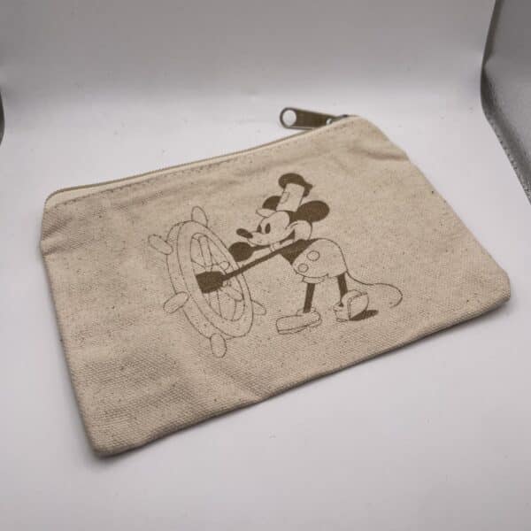 Beige fabric pouch with a zipper and a partial Mickey Mouse print visible on the corner.