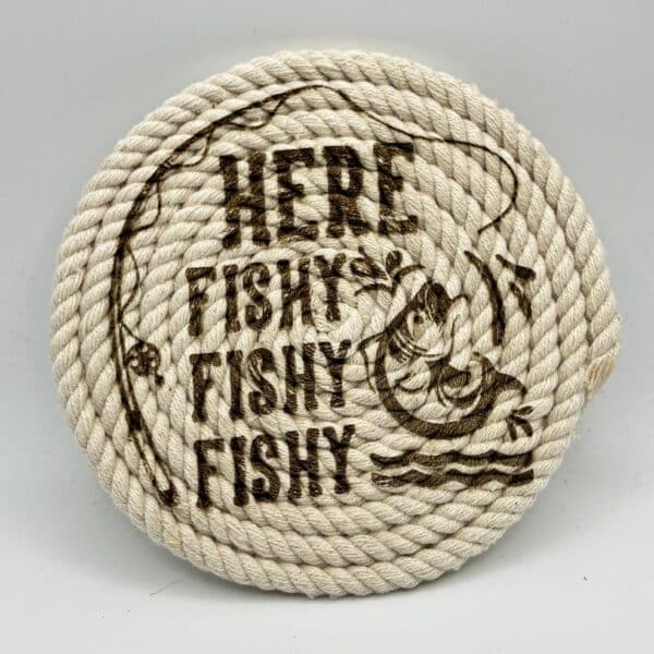 Beige circular rope badge with brown printed text reading 'FISHY' repeated and a small fish illustration.